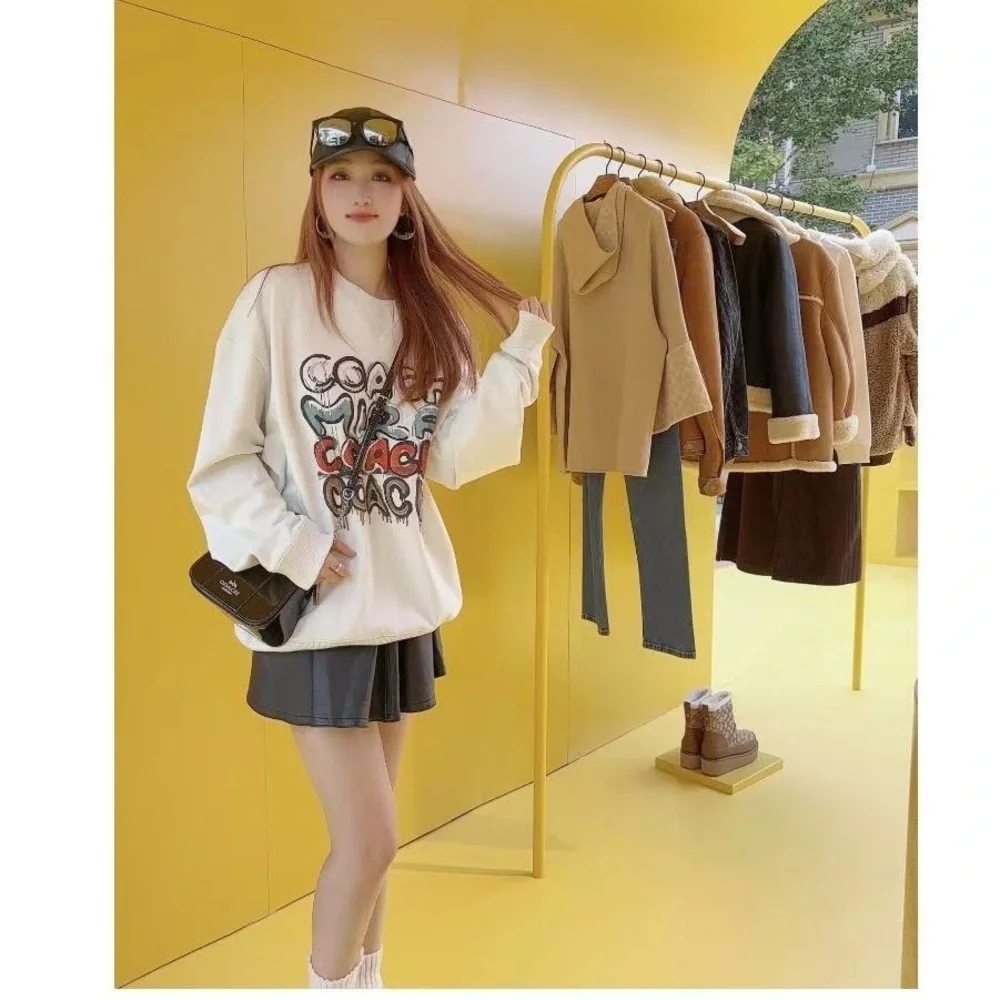 Coach women’s multi Sweatshirt‎ L